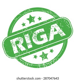Round green rubber stamp with name Riga and stars, isolated on white