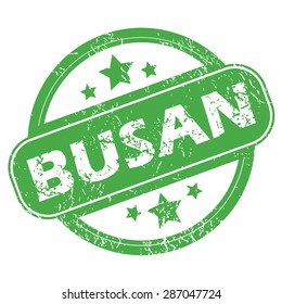Round green rubber stamp with name Busan and stars, isolated on white