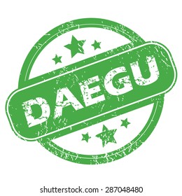 Round green rubber stamp with name Daegu and stars, isolated on white
