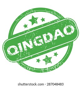 Round green rubber stamp with name Qingdao and stars, isolated on white