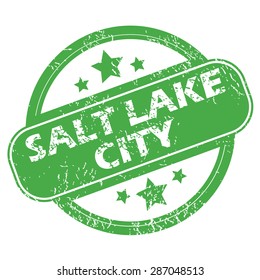 Round green rubber stamp with name Salt Lake City and stars, isolated on white