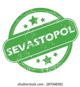 Round green rubber stamp with name Sevastopol and stars, isolated on white