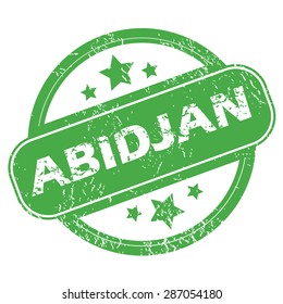 Round green rubber stamp with name Abidjan and stars, isolated on white