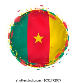 Round grunge flag of Cameroon with splashes in flag color. Vector illustration.
