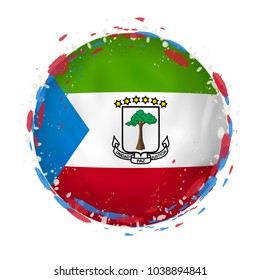 Round grunge flag of Equatorial Guinea with splashes in flag color. Vector illustration.