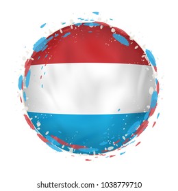 Round grunge flag of Luxembourg with splashes in flag color. Vector illustration.