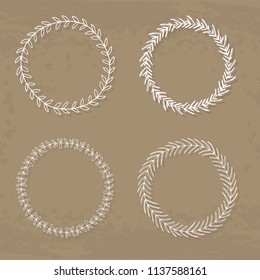 Round handdrawn wreaths on texturized vintage background. Collection of clip art vector bouquets. Romantic wreath with copyspace for your text. 
