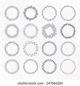 Round handdrawn wreaths on texturized vintage background. Collection of clip art vector bouquets. Romantic wreath with copyspace for your text.  