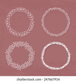 Round handdrawn wreaths on texturized vintage background. Collection of clip art vector bouquets. Romantic wreath with copyspace for your text.  