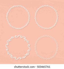 Round handdrawn wreaths on texturized vintage background. Collection of clip art vector bouquets. Romantic wreath with copyspace for your text. 
