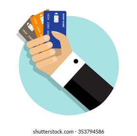Round icon with Hand holding three credit cards for payment