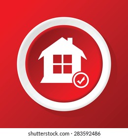 Round icon with image of house with tick mark, on red background