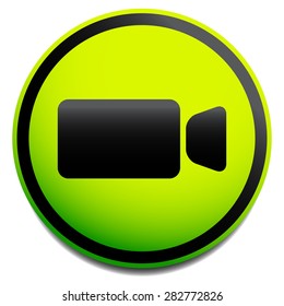 Round icon with small, compact video camera, handycam symbol. Icon for video, multimedia, filming concepts.