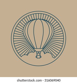 Round logo icon. Air transport and flying. The balloon flies over the cloud in sunlight.