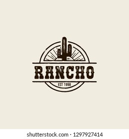 round logo ranch with a picture of a cactus. Vintage style, shabby background, monochrome colors. the emblem of the wild West