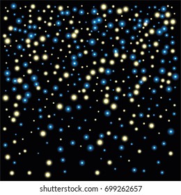 Round luminescent background of a random scatter of golden and blue circles with a glowing effect, isolated on black.