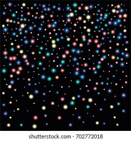 Round luminescent background of a random scatter of rainbow circles with a glowing effect, isolated on black.