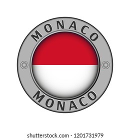 Round metal medallion with the name of the country of Monaco and a round flag in the center