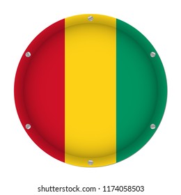 round metallic flag of Guinea with six screws in front of a white background
