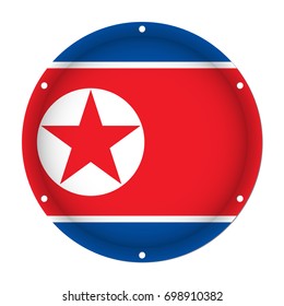 round metallic flag of North Korea with six screw holes in front of a white background