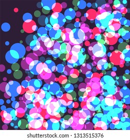 Round multicolored confetti on a purple background. Flying blue, pink, green circles.
