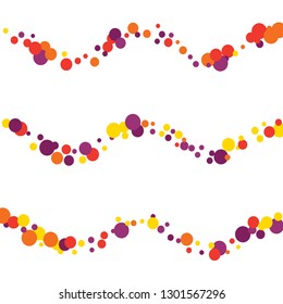 Round multicolored confetti on a white background. Flying red, pink, yellow, purple circles.
