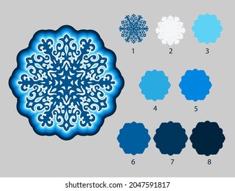 Round multi-layered snowflake of eight layers. Crafts and gifts for Christmas