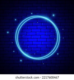 Round neon blue frame on brick wall background