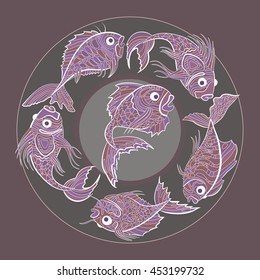 round ornament with a picture of a fish