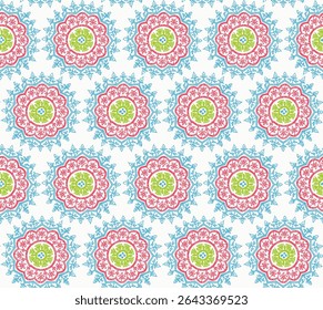 round ornamental block print with blue and pink summer snowflake mandala pattern on white background.