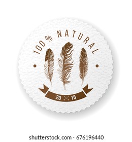 Round paper emblem with hand drawn feathers and type design on white background