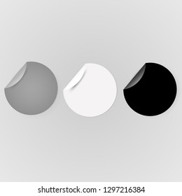 round papers. stickers. grey, white and black colors