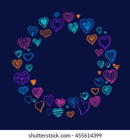 Round pattern with hand drawn hearts in bright colors  on a deep blue background.