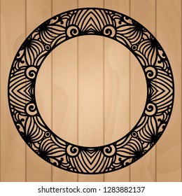 Round photo frame with cutout paper swirls, vector border ornament, template for laser cutting, vintage lace decoration for greeting card or wedding invitation design. Filigree doily photo frame