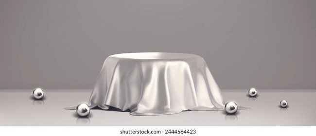 Round product podium covered with silver fabric drapery in gray studio room interior with decorative ball. Realistic 3d vector illustration of pedestal hidden under glossy curtain drapery.