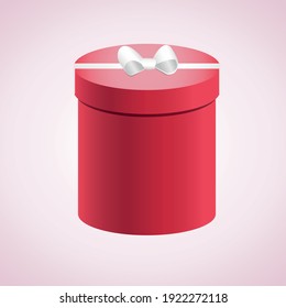 Round red gift box with bow