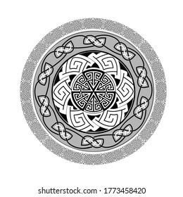 Round rosette pattern of the Vikings. Celtic style. Isolated on a white background. Tattoo. The ornament is black and white.