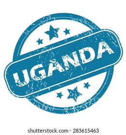 Round rubber stamp with word UGANDA and stars, isolated on white