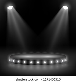 A round scene with overhead lighting and a series of lamas