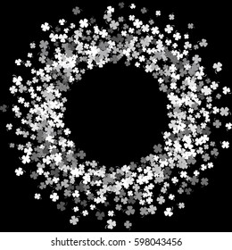 Round silver frame or border of random scatter clover leaves with tails. Elegant St. Patricks day design for festive banner, greeting card, postcard, invitation, flyer, poster. Vector illustration.