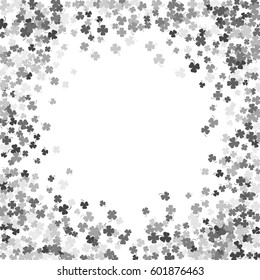 Round silver frame or border of random scatter clover leaves with tails. Elegant St. Patricks day design for festive banner, greeting card, postcard, invitation, flyer, poster. Vector illustration.