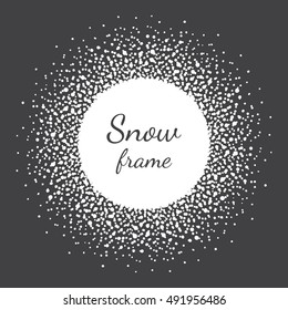 Round snow frame made of spots, dots, splashes, flakes, specks, snowflakes of various size. Circle, snowball shape. New Year, Christmas, winter abstract radial background with empty space for text.