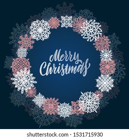 Round snow frame with Merry Christmas text.. Winter concept made of snowflakes. Circle shape. New Year, Christmas blue abstract background with brush lettering