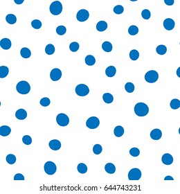 Round spots painted by hand. Chaotic scattered blue dots isolated on white background. Seamless pattern.  Vector illustration.