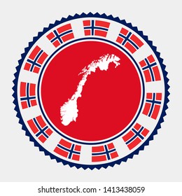 A round stamp with a map of Norway and its flag.  Patriotic travel design.
