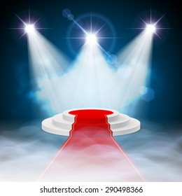 Round stepped white podium with red carpet and illuminated spotlights