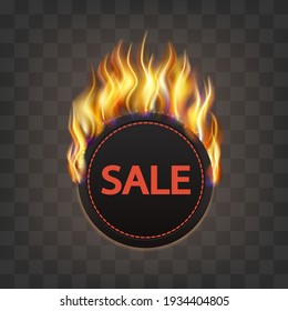 Round sticker or label with fire, advertising for sales. On dark background.