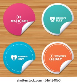 Round stickers or website banners. 8 March Women's Day icons. Tulips or rose flowers bouquet and heart sign symbols. Circle badges with bended corner. Vector