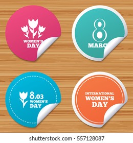 Round stickers or website banners. 8 March Women's Day icons. Tulips or rose flowers bouquet sign symbols. Circle badges with bended corner. Vector