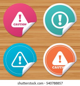 Round stickers or website banners. Attention caution icons. Hazard warning symbols. Exclamation sign. Circle badges with bended corner. Vector